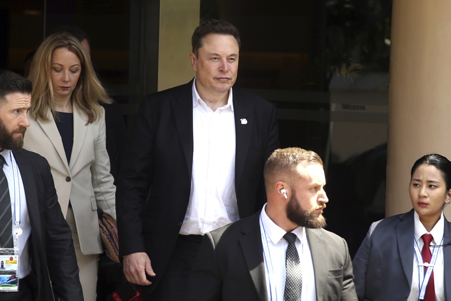 Elon Musk arrives at a water forum.