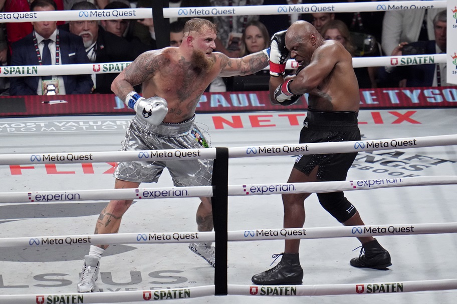 Jake Paul punches Mike Tyson