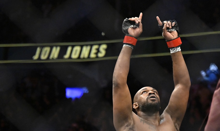 Jon Jones celebrates after beating Ciryl Gane