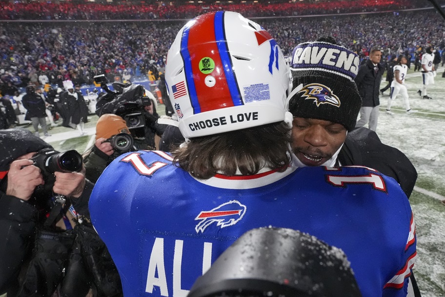 Josh Allen and Lamar Jackson hug after the AFC title game.