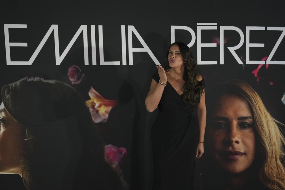 Karla Sofia Gascon blows a kiss while promoting