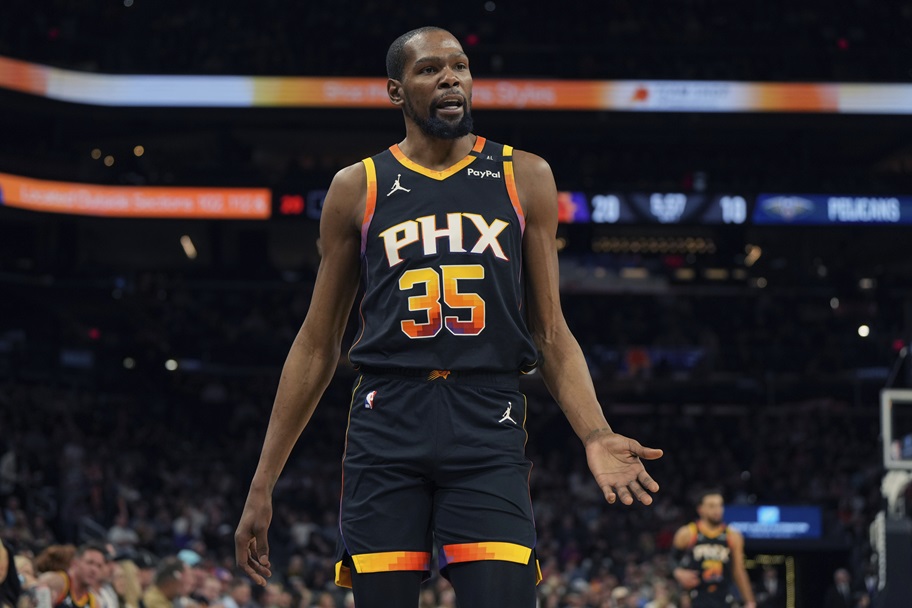 Kevin Durant questions a call during an NBA game.