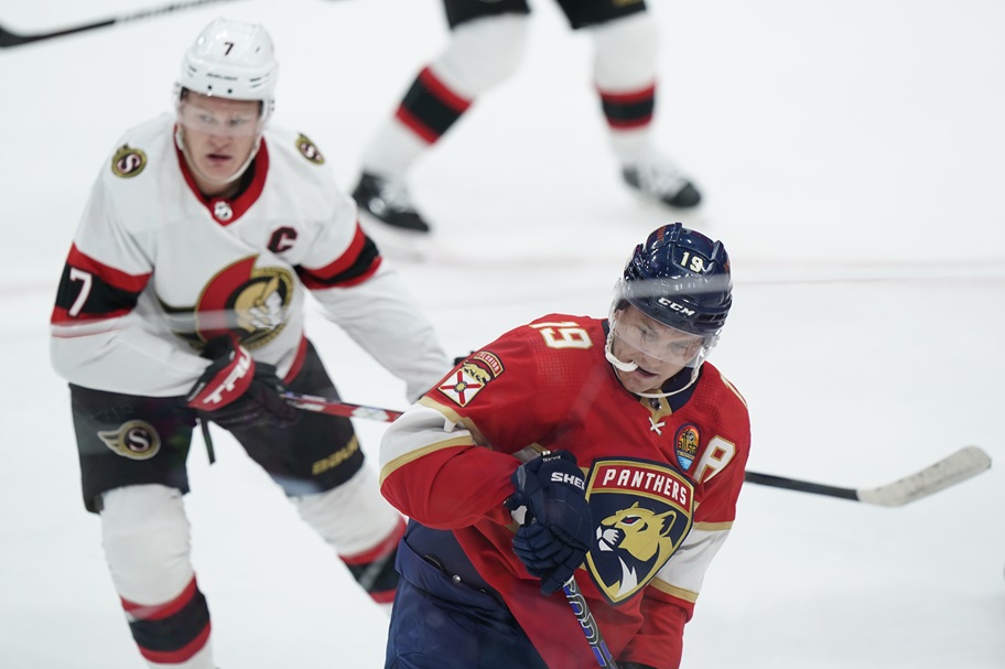Matthew and Brady Tkachuk play each other during an NHL game.